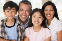 2 Asian adopted children with parents